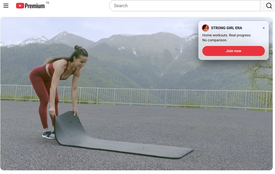 A FitCutter badge over a YouTube player, carrying the creator's name and a call-to-action button.